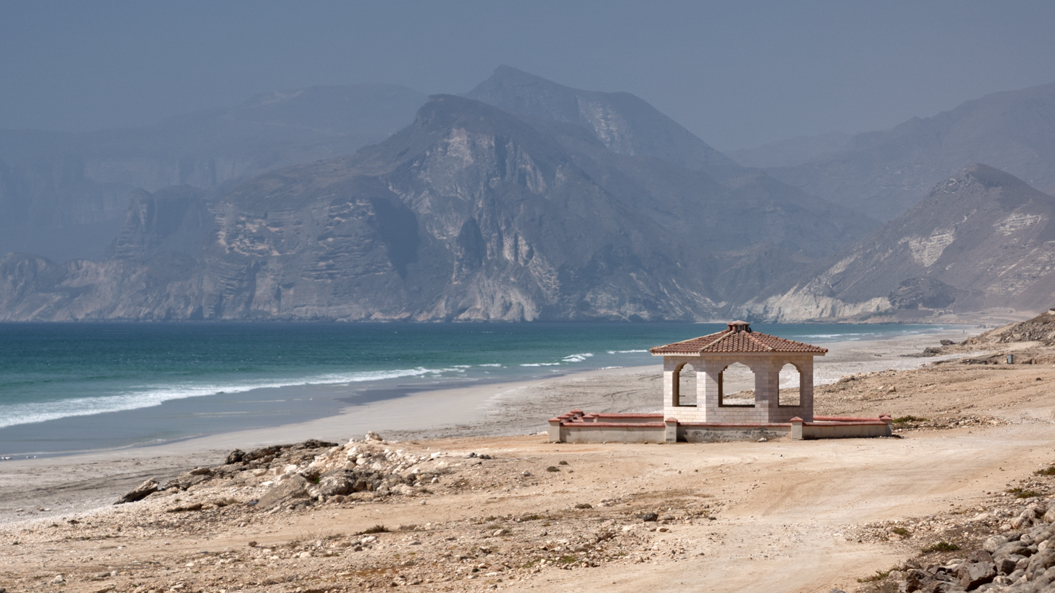 Mughsail beach mountains in the distance